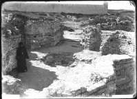 A priest in the baptistery of Uvarov Basilica