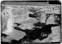 A priest in the baptistery of Uvarov Basilica