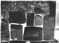 Фрагменты различных надписей и надгробий во дворе музея