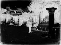Unknown person standing in front of the entrance to the Imperial Archaeological Commission’s museum