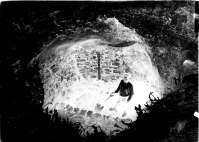 A worker on the excavations of a water cistern in the central area of the ancient city (in the main street?)