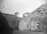 A soldier sitting on the doorsill of vault dating to the Roman period