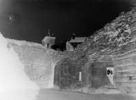 A soldier sitting on the doorsill of vault dating to the Roman period