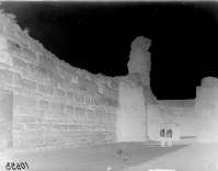 Military men (officer and soldier?) in between of the defensive walls